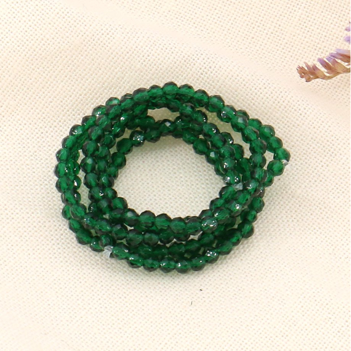 6 bagues perles cristaux facettés élastiques 0423149 vert foncé