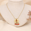 Collier pendentif nénuphar acier doré, cabochons et breloques en pierres véritables 0123573 orange foncé