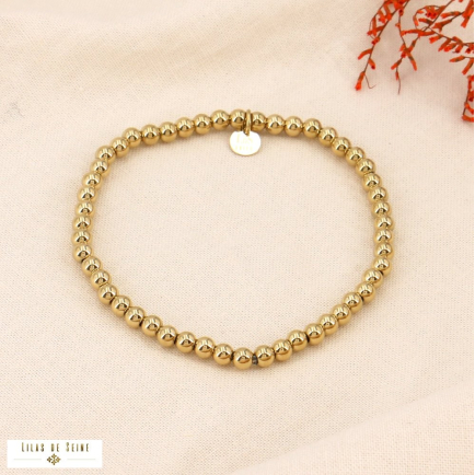 Bracelet élastique acier inoxydable petites billes 0223588 doré