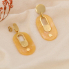 Boucles d'oreilles pendantes acier inox étoile résine marbrée 0324113 jaune