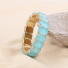 Bracelet élastique acier inoxydable strass colorées facettées 0224089 bleu