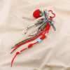 Bijou de sac ou porte-clés fraise dentelle perles rouge