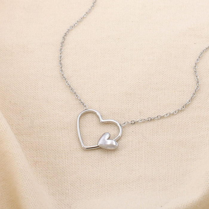 Collier cœur ouvert et cœur brillant acier inox. 0125135 argenté