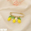 Broche acier résine citron marguerite feuille 0525035 jaune