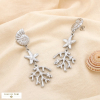 Boucles d’oreilles acier corail spirale astérie 0325093 argenté