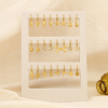 Ensemble 12 mini-créoles acier pendentif thème varié 0325180 doré