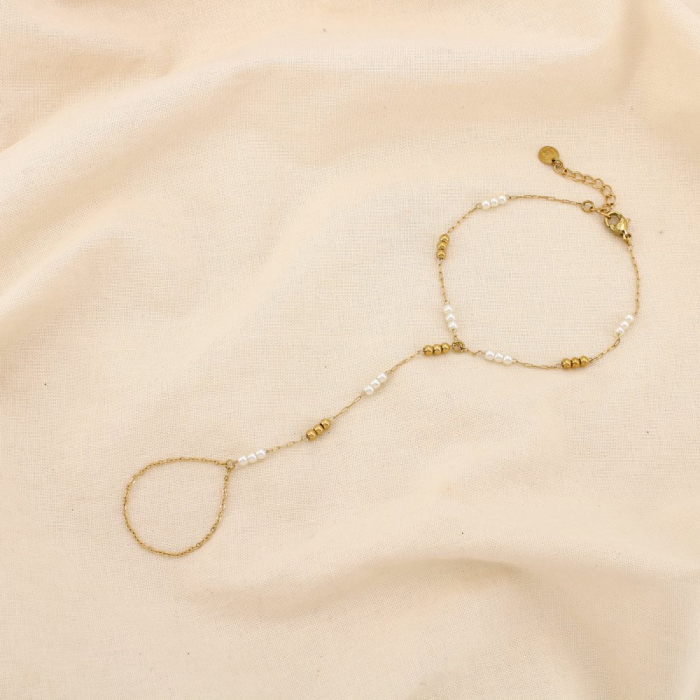 Bijou de main acier inoxydable perle acrylique 0225151 doré