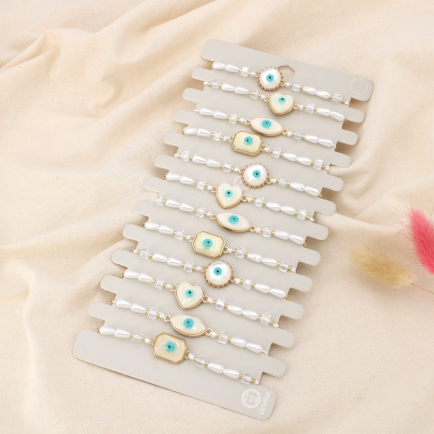 Ensemble 12 bracelets coulissant œil résine cristal 0225248 blanc