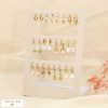 Ensemble 12 boucles d'oreilles acier acrylique nacre 0325200 blanc