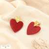 Boucles d’oreilles acier inox. cœur résine pailletée 0325566 rouge