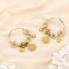 Boucles d’oreilles créoles fleur acier résine marbré 0325538 naturel/beige