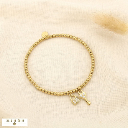 Bracelet élastique clé cadenas bille acier inox 0225567 doré