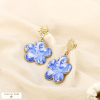 Boucles d’oreille pendantes fleur émaillée acier 0326033 bleu