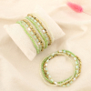 Ensemble 12 bracelets élastique cristal minimaliste 0226119 vert