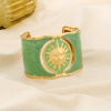 Bracelet manchette soleil lune ajourée acier émail 0226105 vert