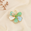 Broche aimantée fleur métal émaille résine strass 0526046 vert