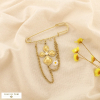 Broche épingle à nourrice acier inox charms fleur 0526049 doré