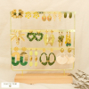 Ensemble 14 boucles d'oreilles acier inox floral 0326166 vert