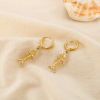 Boucles d’oreilles acier émail poisson squelette 0326156 écru