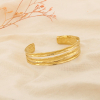 Bracelet jonc ouvert acier inoxydable ajouré martelé 0226078 doré