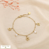 Bracelet étoile acier inox ajouré perle acrylique 0226177 doré