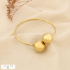 Bracelet jonc ouvert acier inoxydable embouts boules 0226091 doré
