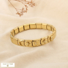 Bracelet élastique acier maillons articulés strass 0226513 doré