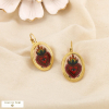 Boucles d’oreilles acier émail peint résine cœur œil 0326503 doré