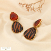 Boucles d’oreilles CLIP acier résine motif zèbre 0326587 cognac