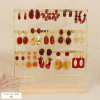 Ensemble 15 boucles d'oreilles acier nuance rouge 0326595 rouge bordeaux