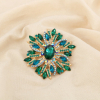 Broche floral rayonnant métal strass cristal AIMANTÉ 0526514 vert